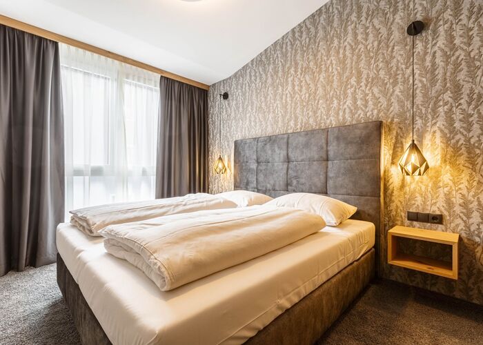 Schlafzimmer - Zillertal Suites Fügen by ALPS RESORTS