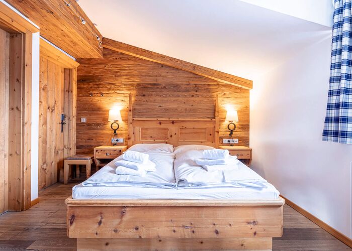 Schlafzimmer Penthouse Hahnenkamm - Dorfresort Kitzbühel