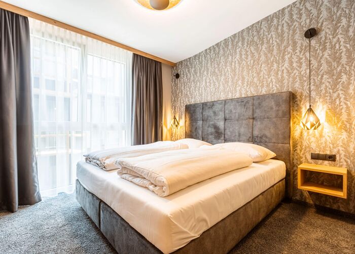 Schlafzimmer - Premium Ferienwohnung mit 2 Schlafzimmern