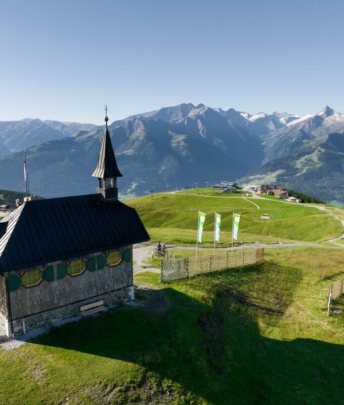 View from the Elisabeth Chapel on the Schmittenhöhe of the Kitzsteinhorn and the Hohe Tauern mountains.