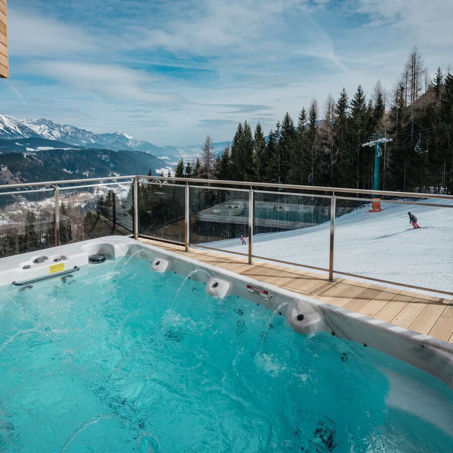 F aussen jacuzzi chalet reiteralm