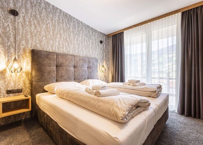 Schlafzimmer - Zillertal Suites Fügen by ALPS RESORTS