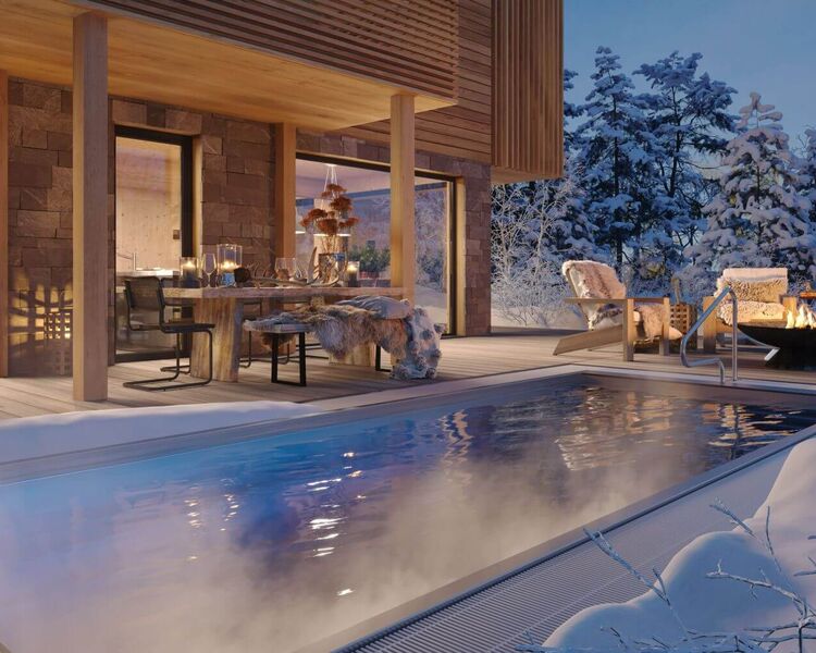 Holiday home with pool and fire bowl on a romantic winter's night