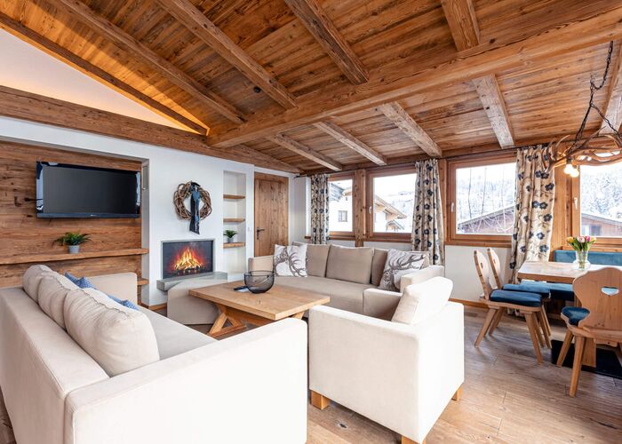 Wohnbereich Penthouse Hahnenkamm - Dorfresort Kitzbühel