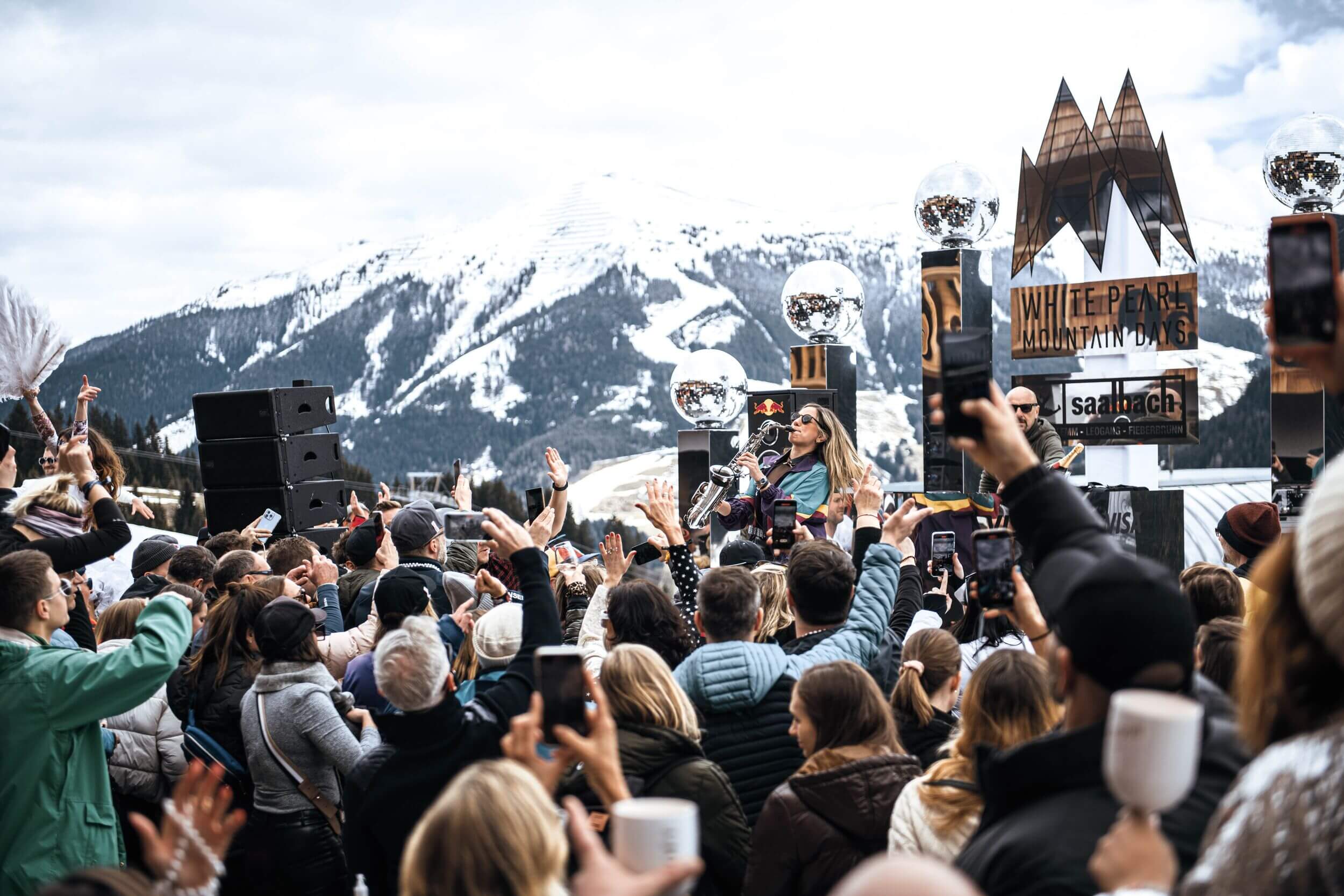 Celebrating people at the White Pearl Mountain Days in Saalbach